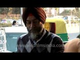 Sardarji drinks fresh fruit juice on the roadside