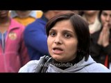 Physically handicapped lady persuading people to speak out against rape at Delhi Haat