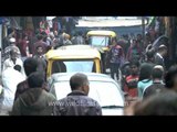 Auto plying on a small alley in Hong kong market, Dimapur