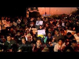 People holding candle night vigil against gang rape