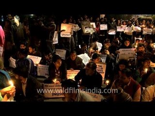 Gang rape protesters sit out in the cold weather