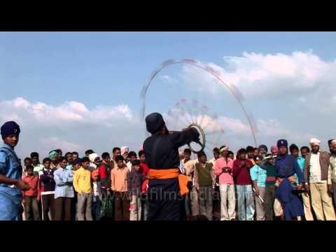 Sikh man with Gatka at Rural Olympics