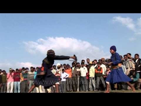 Sikhs, fighting with Fari Gatka at Kila Raipur Festival