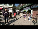 Supporters cheer on the runners of the first Mussoorie Half Marathon