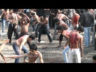 Shia muslims beat their chests during Muharram