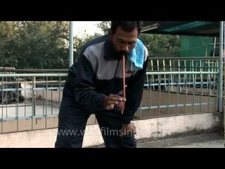 Cleansing digestive tract by swallowing small rubber tube : Danda Dhauti yoga