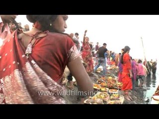Devotees converge on the bank of Yamuna for Chatt puja
