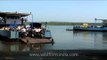 Taking Bikes and cars on Ferries across Mapusa River at Penha de France, Goa