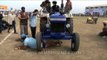 Life threatening sport - men crushed under a tractor at Kila Raipur