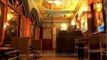Doma's Inn : reception and cafe embellished with Burmese Buddha idol and Tibetan murals