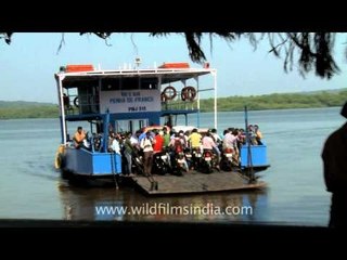 Ferryboats crossing Mapusa River at Penha de France, Goa