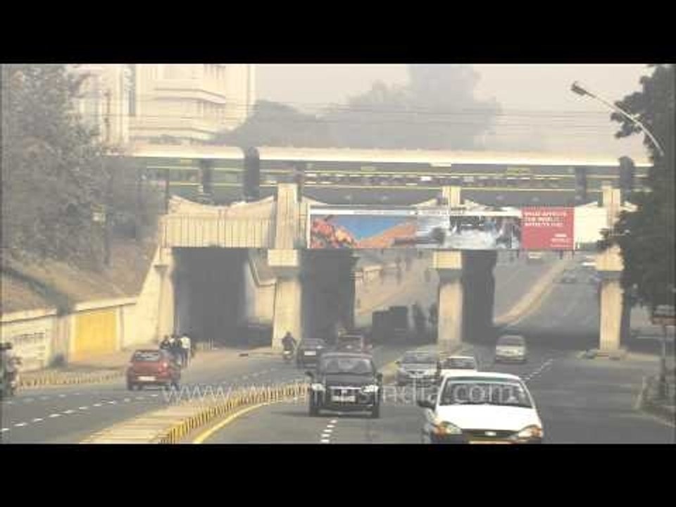 Steam engine train passing over a bridge in Sar...