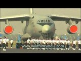 Men of the Indian Air Force march past the Ilyushin IL-76 plane