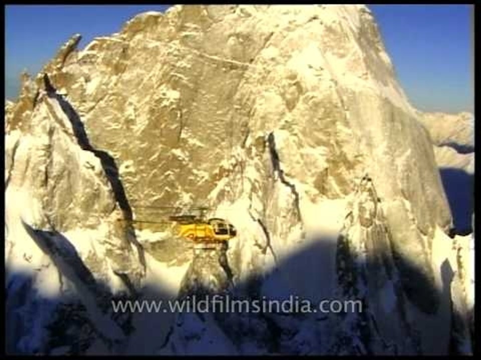 Helicopter flight trip over the highest mountain range in the world - The Himalayas!
