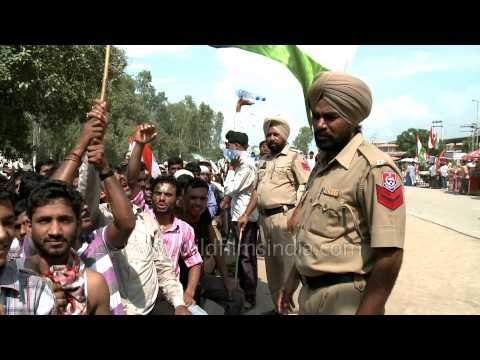 Waving the Indian flag on Independence Day in Wagah Border