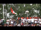 Indian crowd waving the tri colur flag in Wagah Border