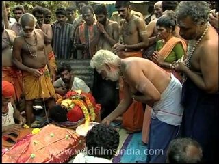 Believers of Lord Ayappan bow down at his temple