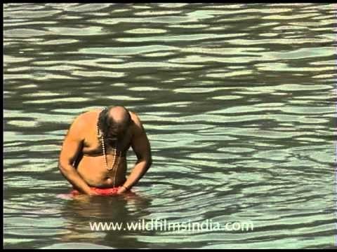 Lord Ayappan's devotees bathing in the river!