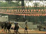 Devotees of Lord Ayappan carry offerings on their head, during trek