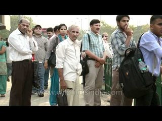 Scratching the crotch while waiting for the bus!