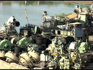 Remains of dismantled ship resembling broken toys, Alang!