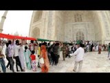 Crowd at Taj Mahal through fish eye lens