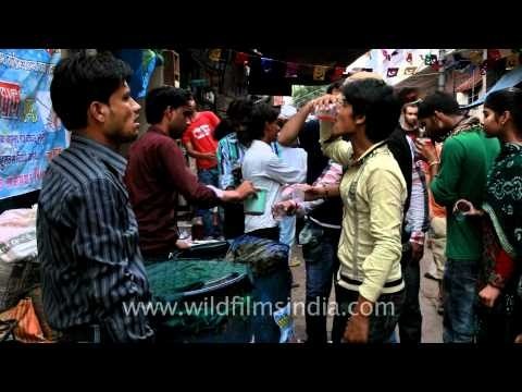 Visitors enjoying local soft drinks near south gate of Taj Mahal