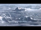 Cloud covered high peaks of Nepal as seen from the air