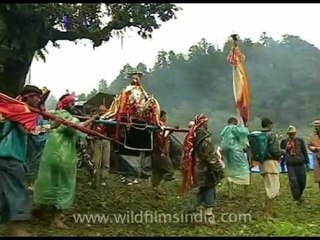 Beating the rainy weather for goddess Nanda Devi