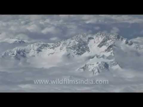 Kanchenjunga through clouds like ice cream, over the Himalaya...
