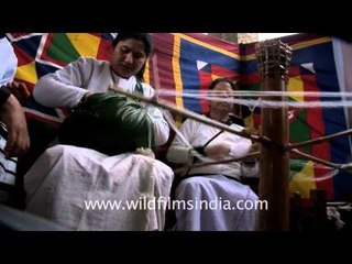 Mizo women spinning yarn for clothes