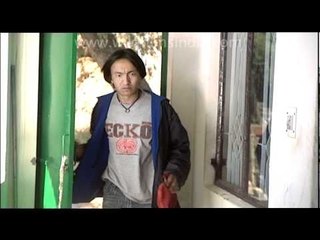 Tibetan boy goes to Tenzin's home
