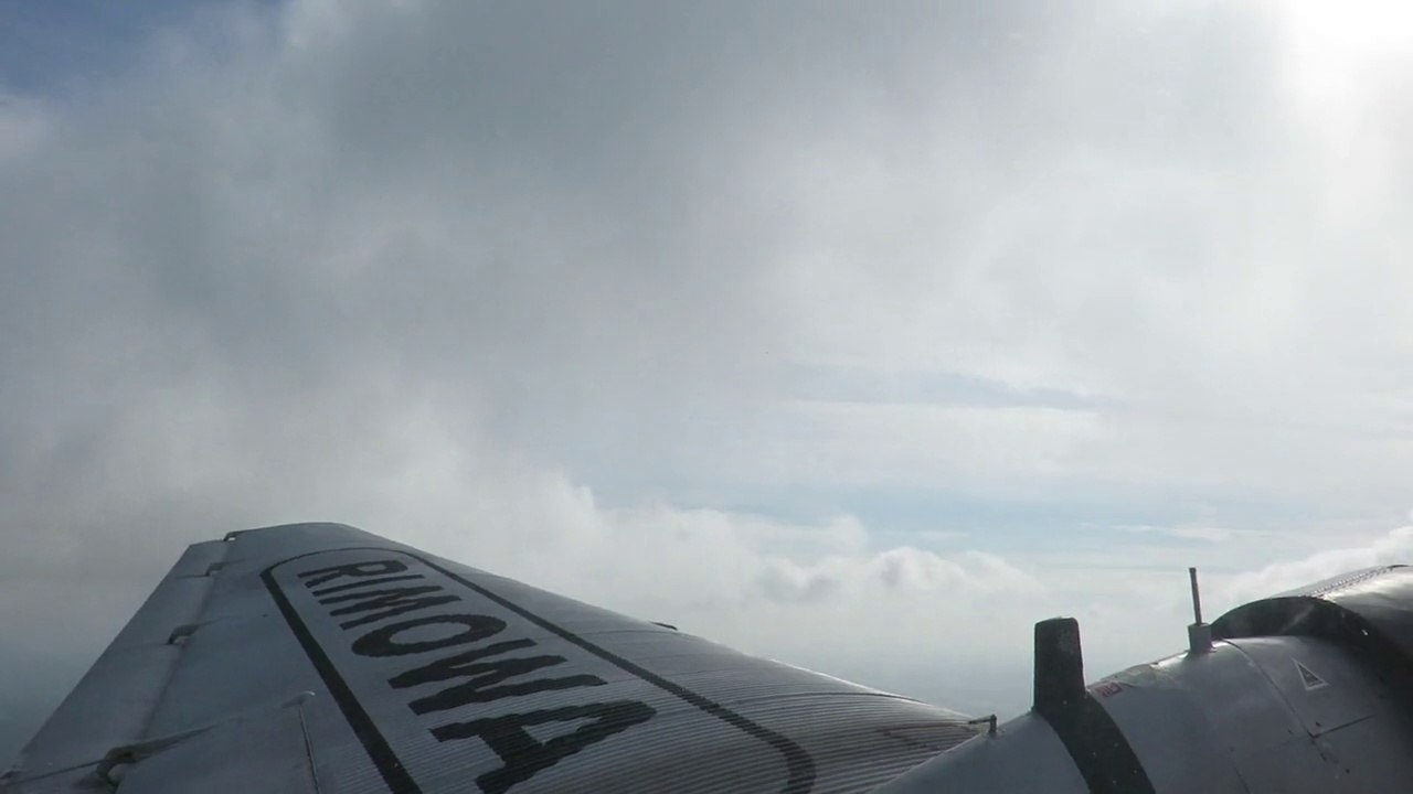 Flight with Ju-52 HB-HOT p06 - under Clouds
