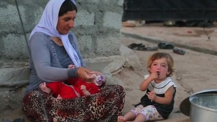 Yazidi refugee: Islamic State took women "for themselves"