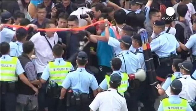 Clashes in Hong Kong as pro-democracy barricades are removed
