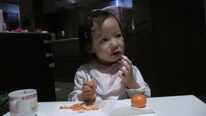 Girl Eating Oranges