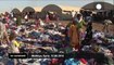 Exhausted Yazidis fleeing militants reach refugee camp in Syria