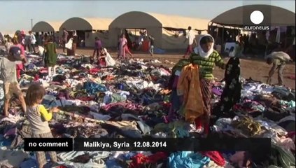 Descargar video: Exhausted Yazidis fleeing militants reach refugee camp in Syria