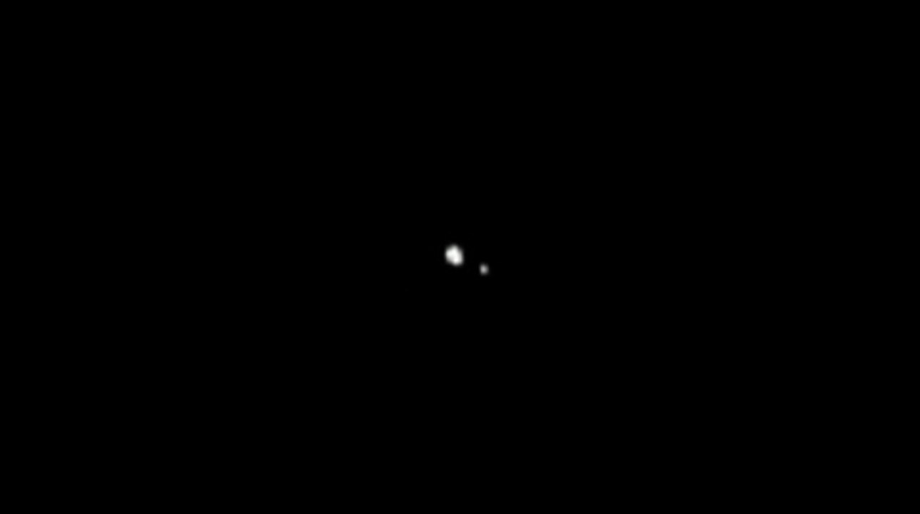 Pluto and Giant Moon Charon Imaged By Probe