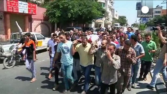 Four Palestinian bomb disposal officers dead and two journalists killed in Gaza