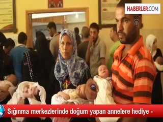 Sığınma merkezlerinde doğum yapan annelere hediye -