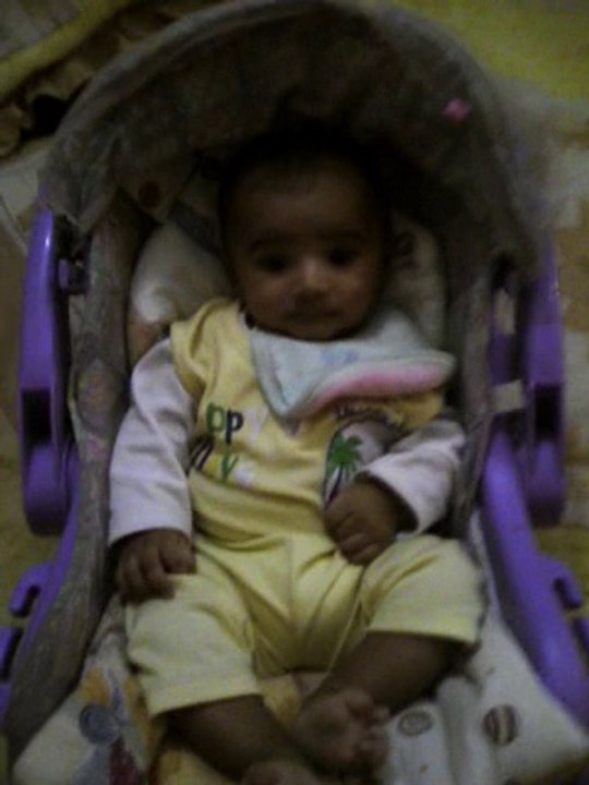 baby xaviyar of two mOnths in cradle