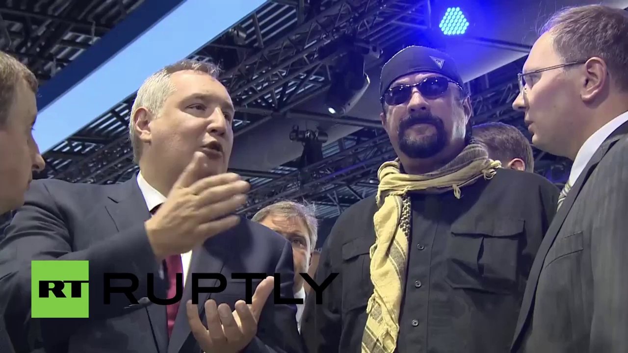 Russia: Steven Seagal wields Russian sniper rifles at OboronExpo 2014