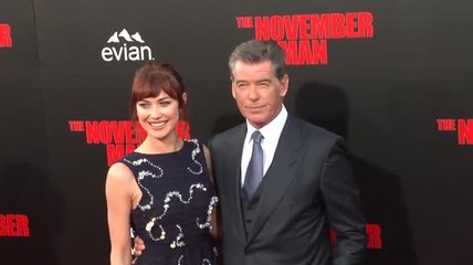 Pierce Brosnan And Olga Kurylenko Have A License To Look Hot For The November Man Premiere.