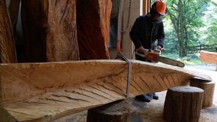 Brzezinski transforms trees into art with a chainsaw