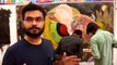 Aurangzeb and team paint Mural at Arts Council at the I am Karachi Youth Festival