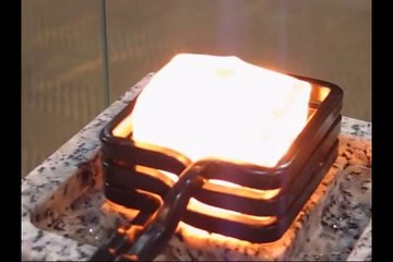 Red-hot ice cube by induction heating
