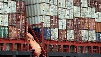 One dead as dozens found in UK container