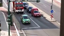 So dumb car driver doesn't want to let the firefighter truck go!