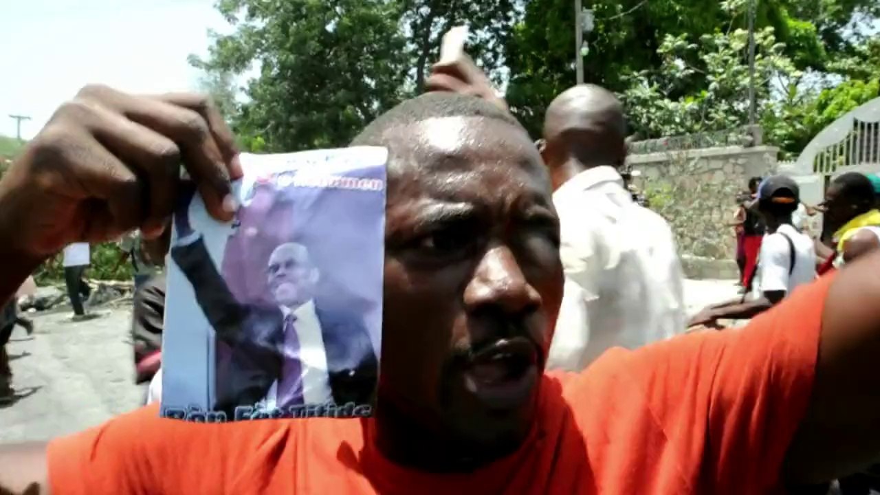 Protest in Haiti against arrest warrant issued...